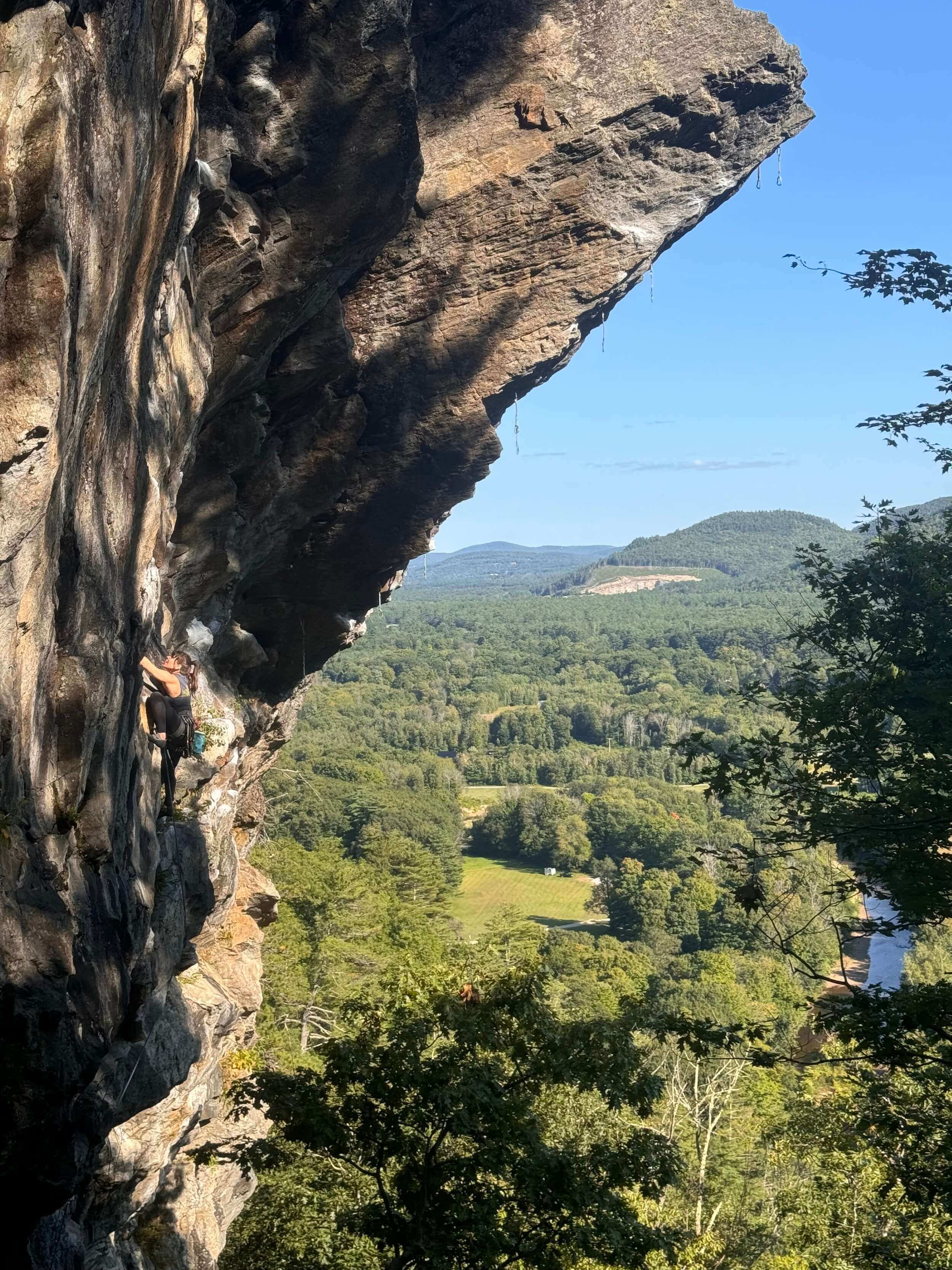 Maya Kumits sport climbing at Rumney, New Hampshire