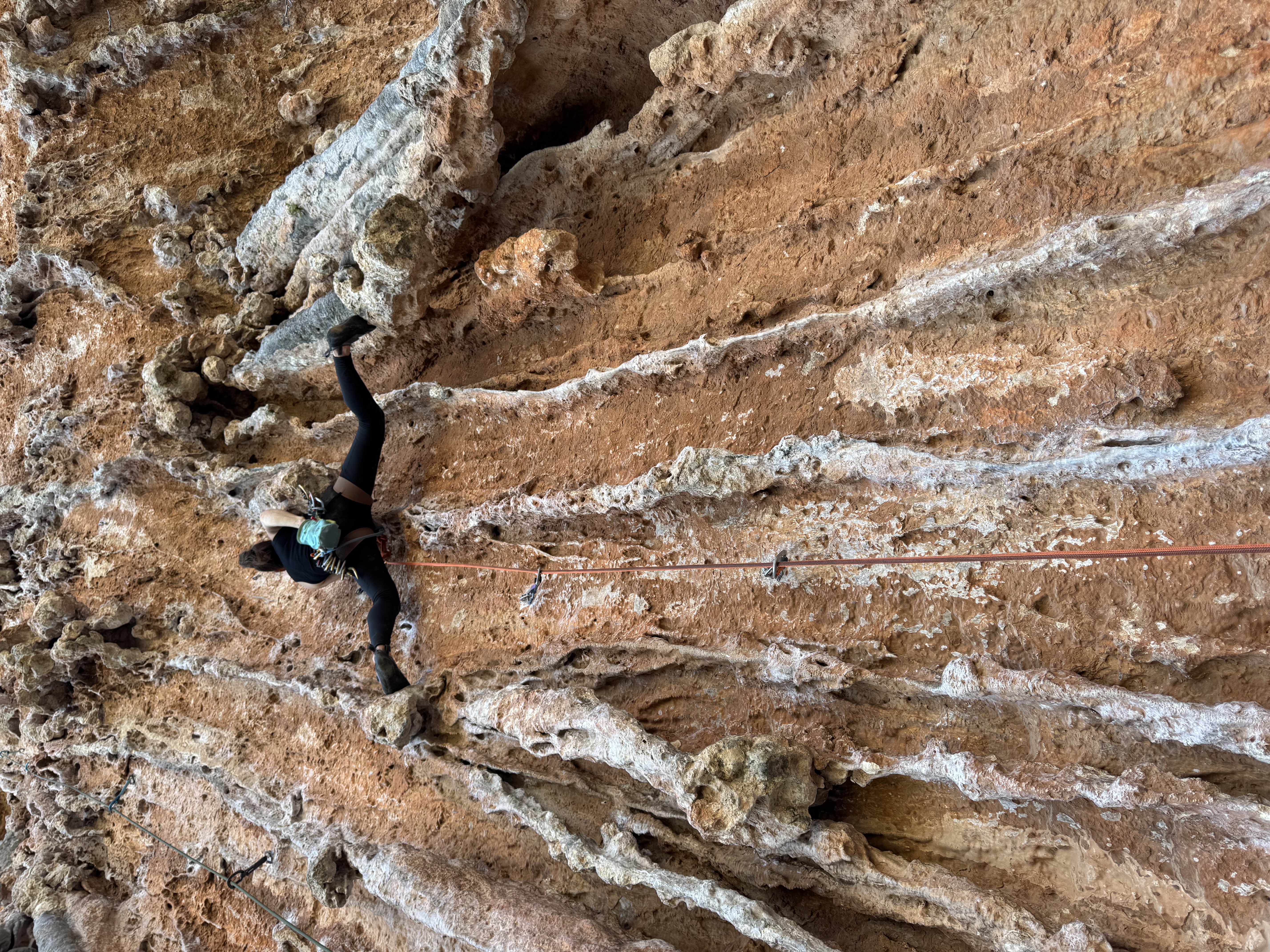 Maya Kumits sport climbing Tufa Tango in Sector Mars in Leonidio, Greece